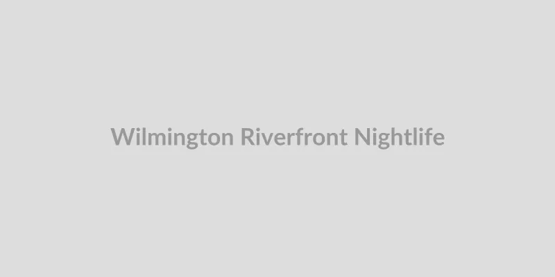 City lights reflecting on the Wilmington Riverfront at night