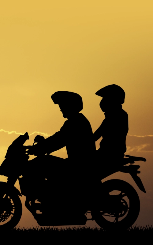 Pillion riding sunset