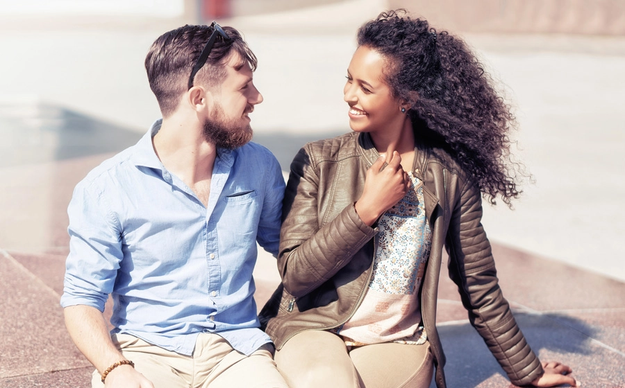 African American woman and Caucasian man on a date