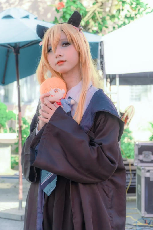 Illustrative photo of an anime-style fan, not an actual member