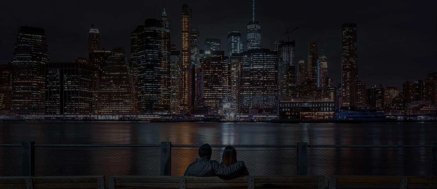 New York City landscape view with couple looking on after meeting at New York Singles dating app