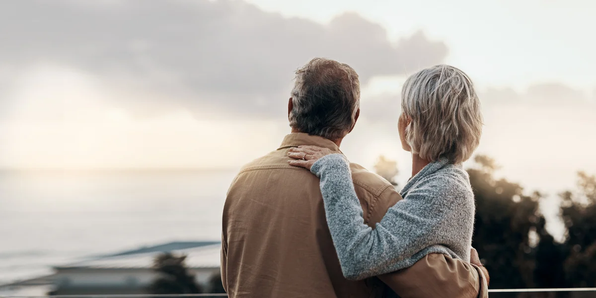 Mature couple at sunset, enjoying life with peace of mind