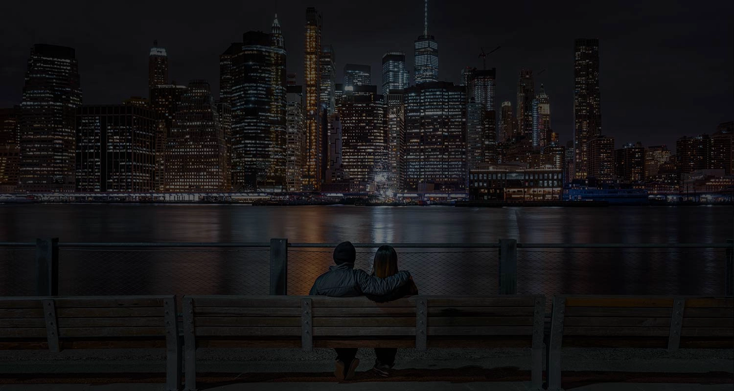 New York City landscape view with couple looking on after meeting at New York Singles dating app