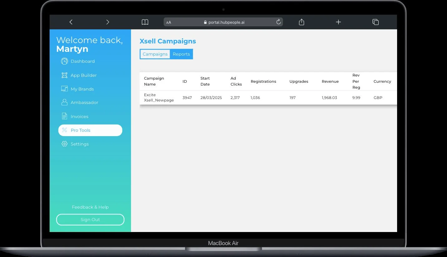 The Xsell Campaigns screen with the Campaigns and Reports tabs at the top and a table of campaigns below showing campaign name, ID, start date, ad clicks, registrations, upgrades, revenue, revenue per registration and currency.