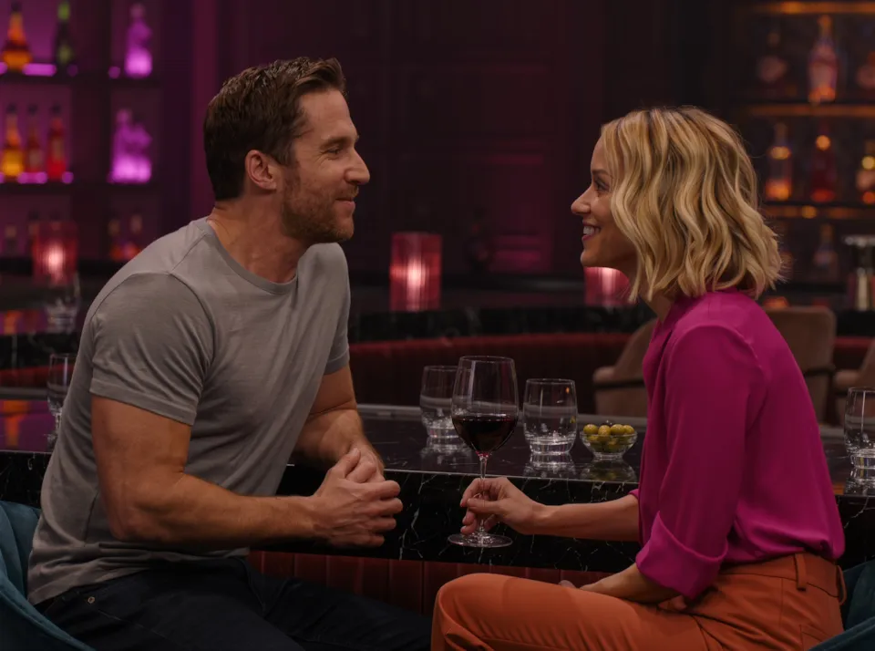 Couple talking over wine