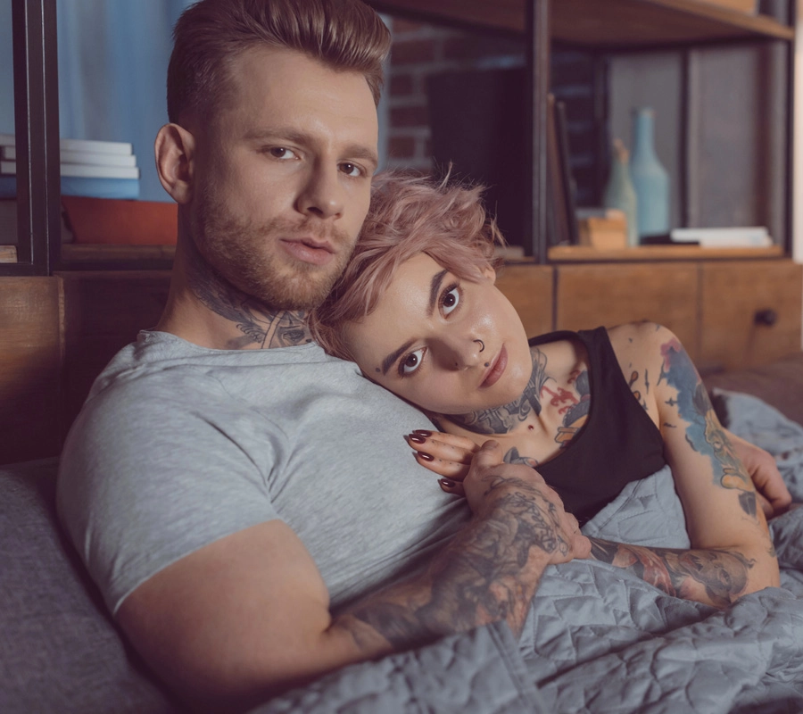 Attractive couple with tattoos in Richmond