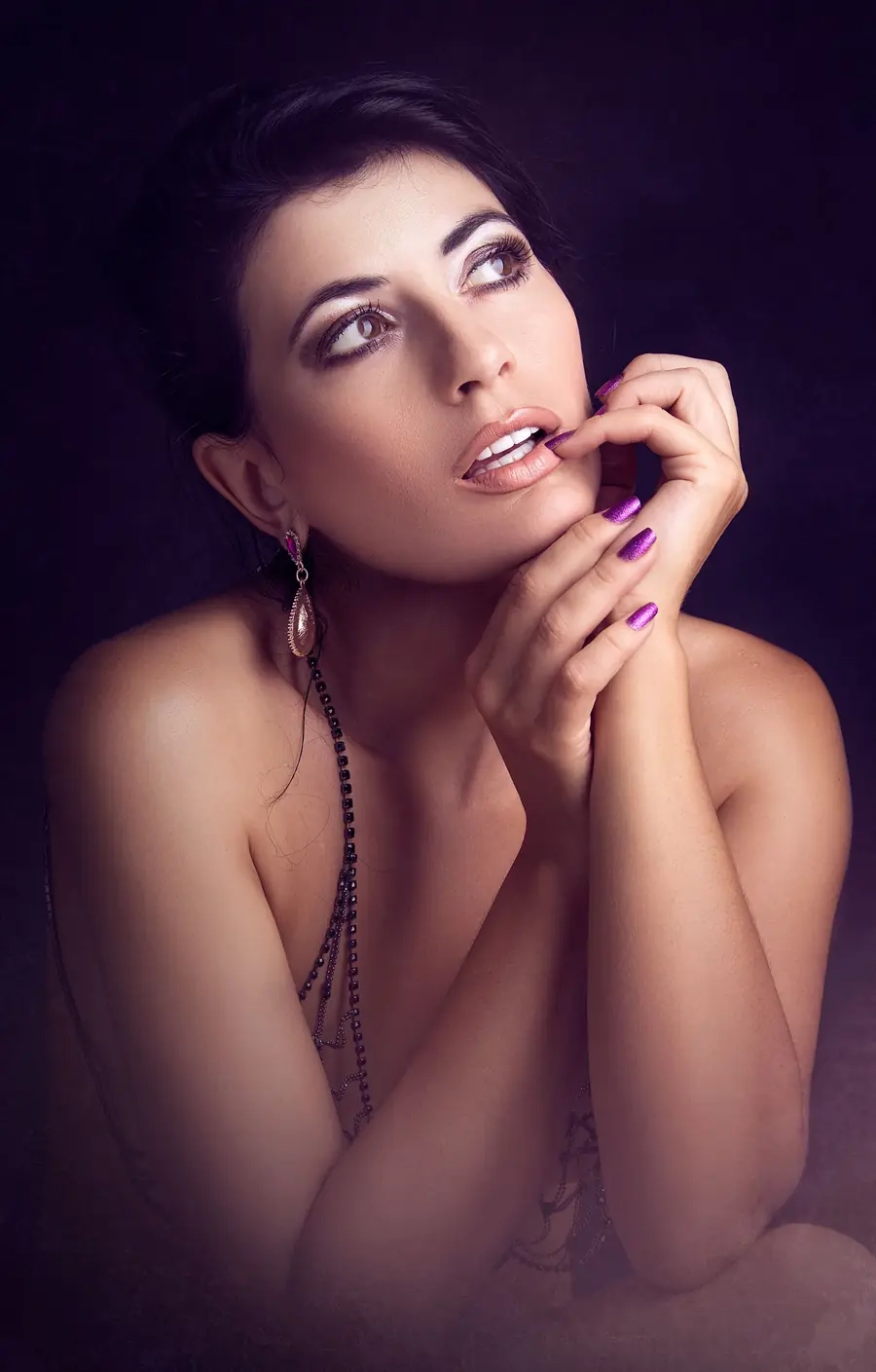 Glamorous adult woman posing for a profile portrait