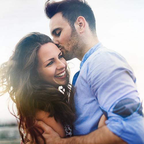 couple smiling, making new memories.