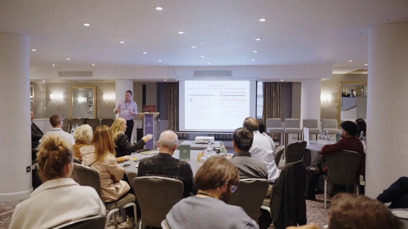 A speaker presenting to delegates at GDI London 2026