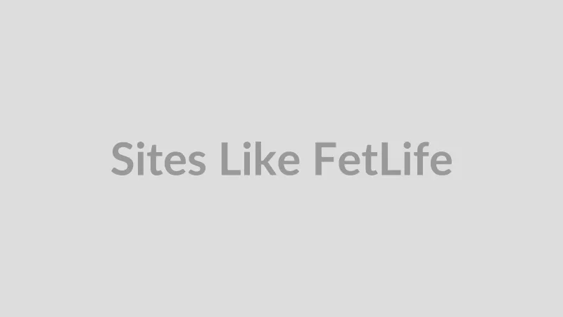 Laptop showing a kink community website at night