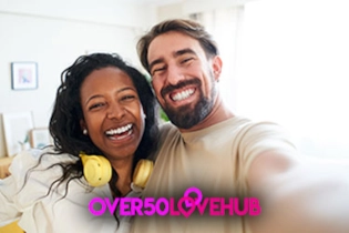 Mature couple enjoying a selfie after meeting on Over 50 Love Hub.