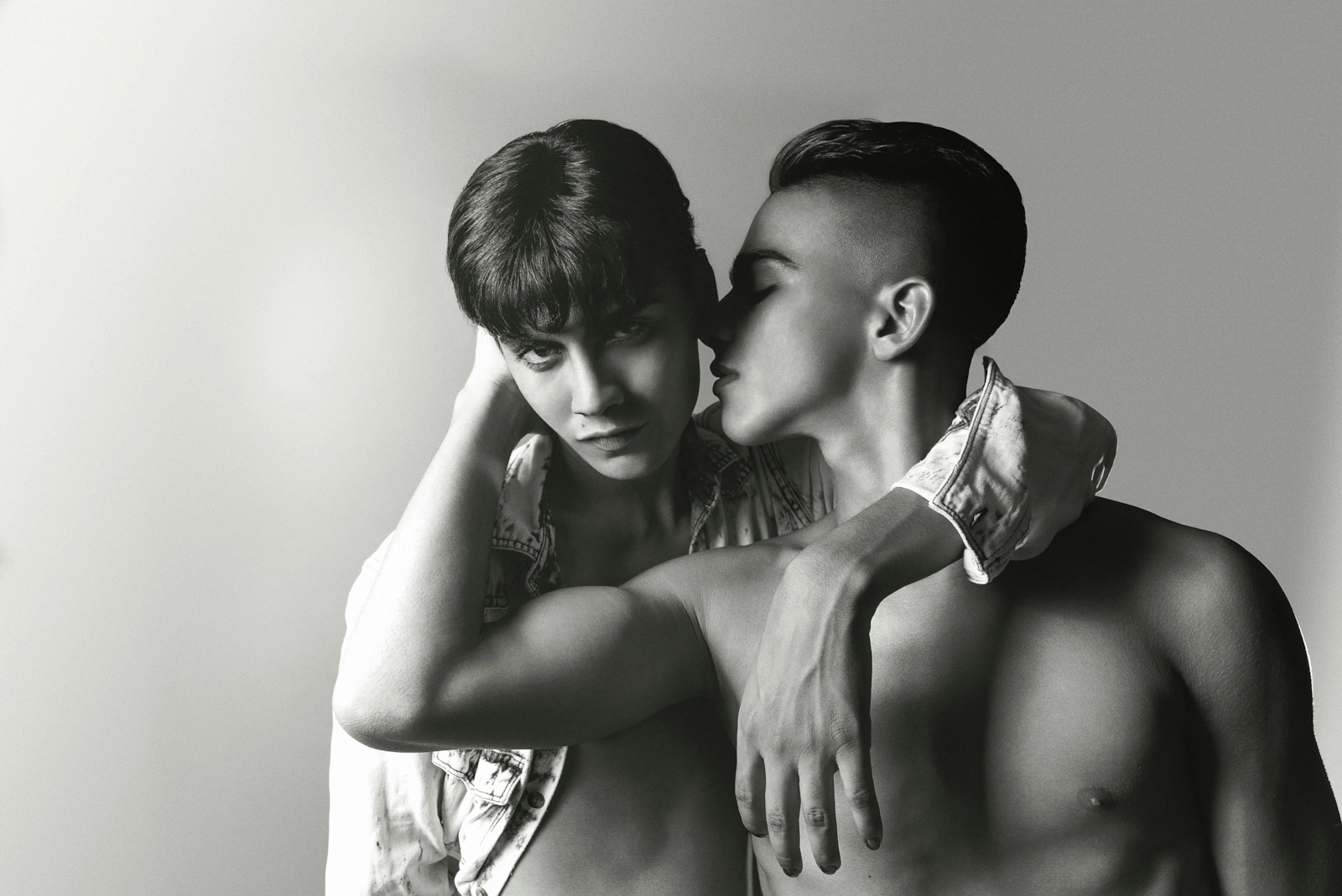 A couple embracing in black and white