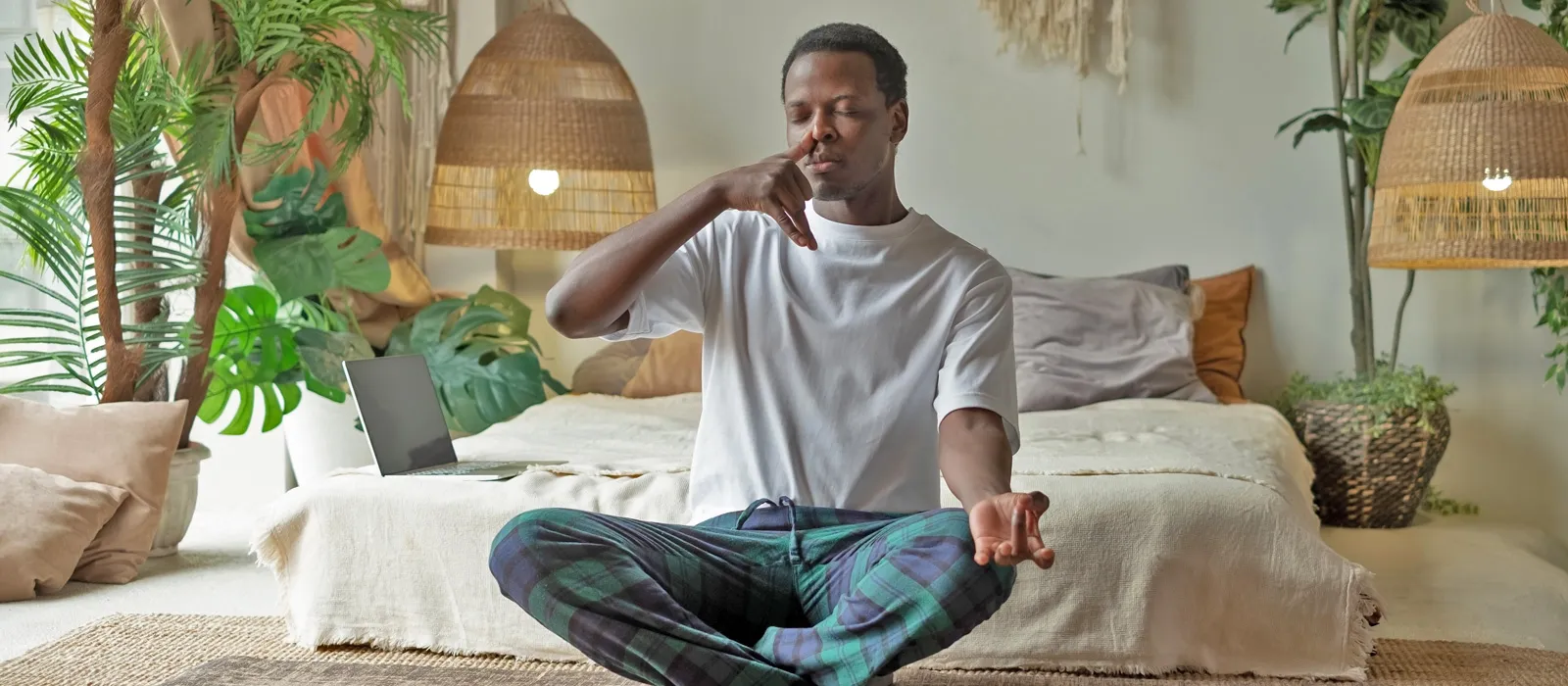 A man practicing seated breathwork