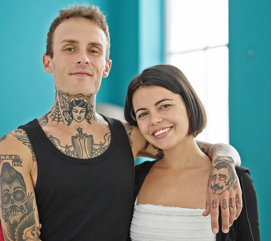 attractive couple tatted up in Miami