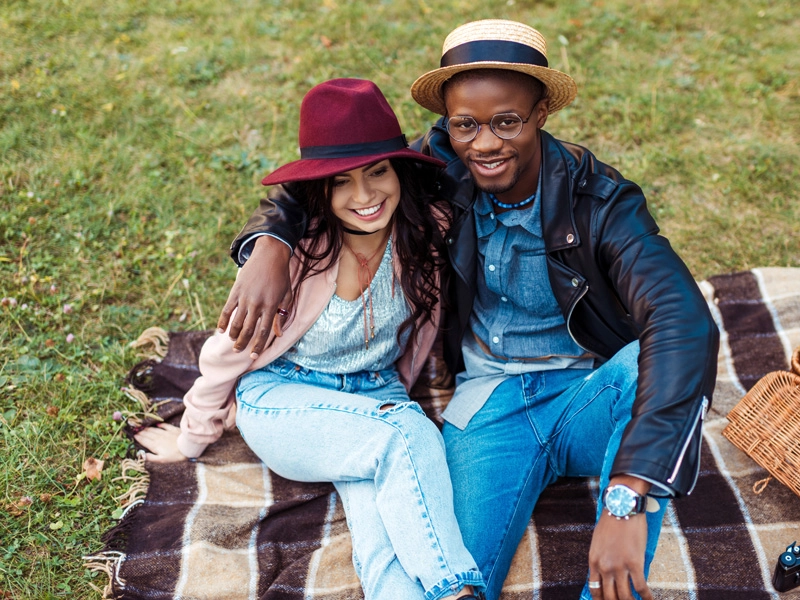 Confident beautiful mixed couple smiling