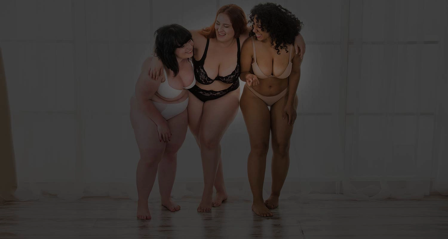 Happy BBW Curvy Singles embracing on the BBW-Lover.com dating app