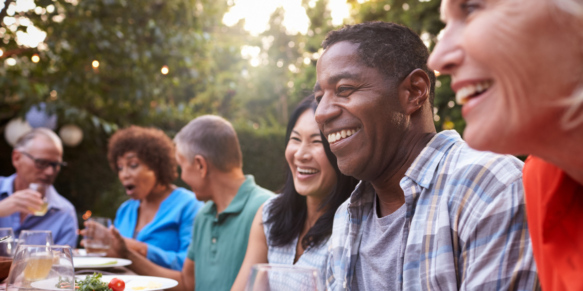 Group of mature friends enjoying each other’s company