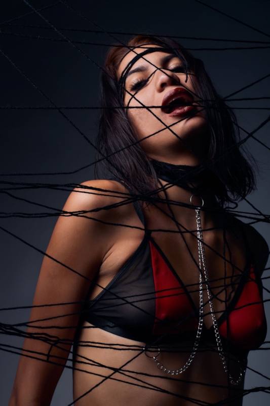 Illustrative stock photograph representing a thoughtful shibari dating connection