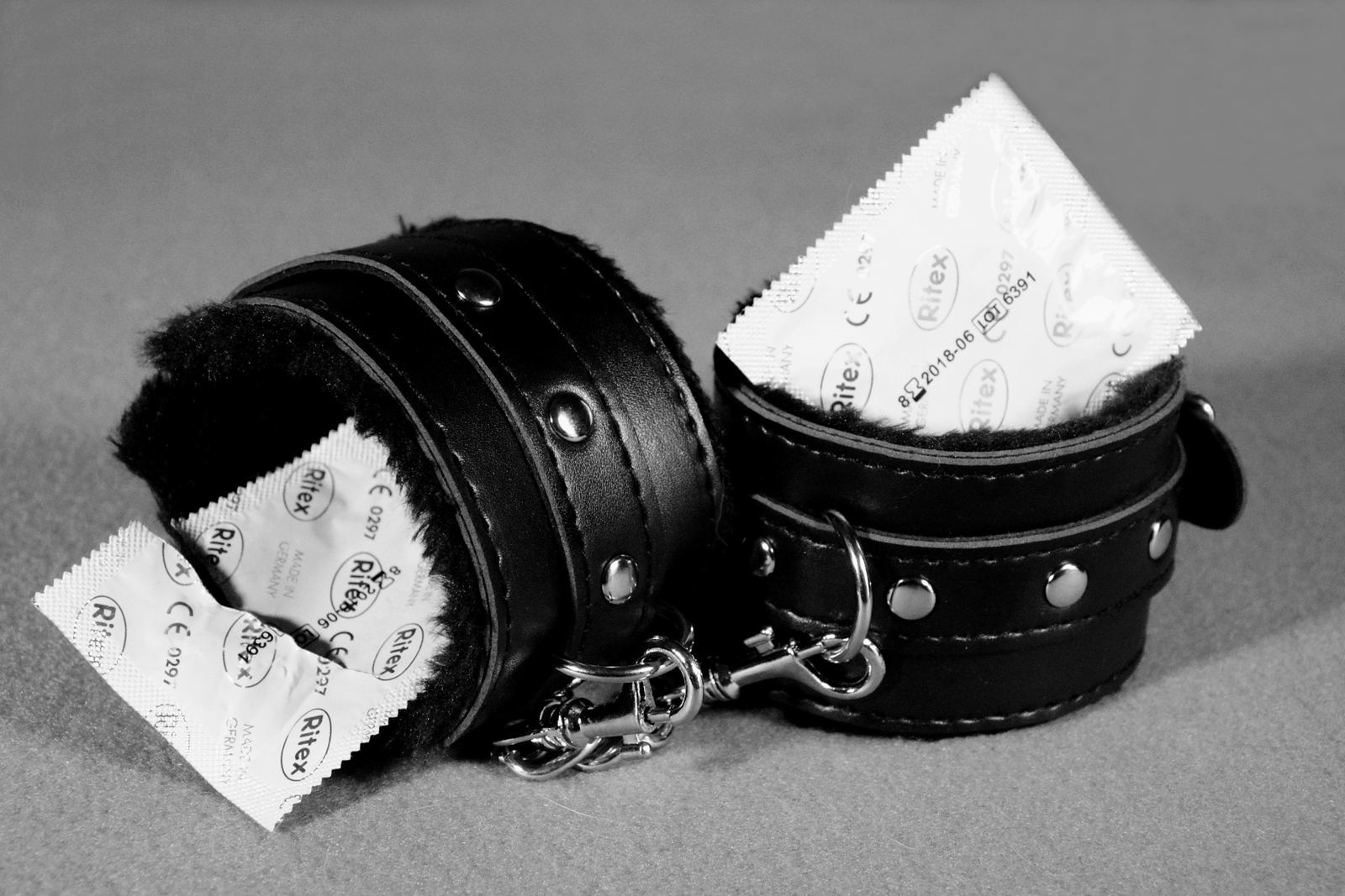Leather cuffs with condom packets