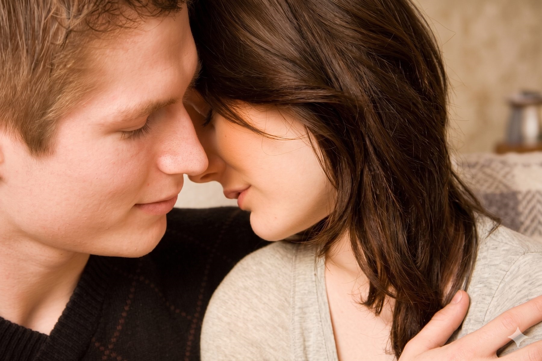 A couple sharing a close, intimate moment