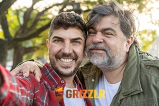 Happy bear couple taking a selfie together - Grizzlr